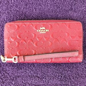 COPY - Coach long zip accordian wallet red with signature "c"